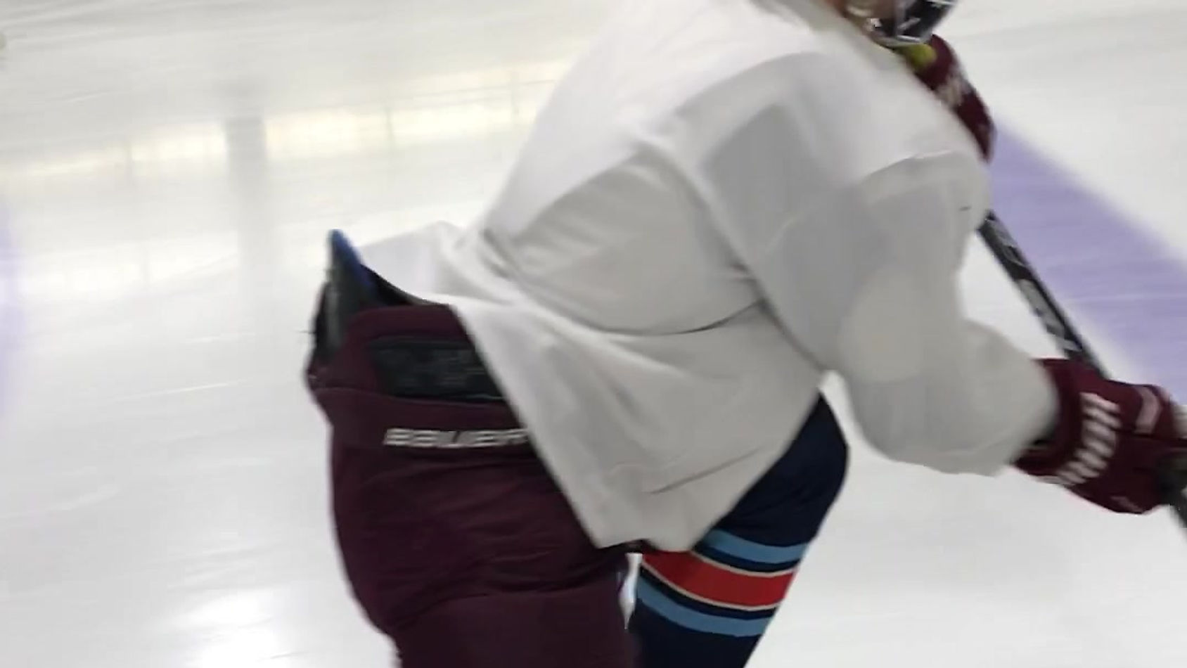 Inner Edge C-Cuts While Lowering Knee to Ice